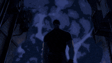 a silhouette of a man standing in a dark alleyway at night