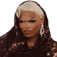 a close up of a woman 's face with a veil and earrings