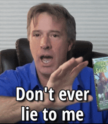 a man is holding a dvd that says cool saves