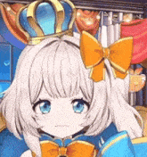 a girl with a crown and a bow on her head is standing in a room .