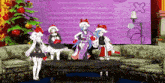 a group of anime characters wearing santa hats are standing around a table in front of a christmas tree