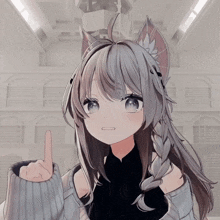 a girl with a cat ear on her head is pointing up