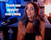 a girl wearing headphones says " thank you guys for everything "