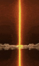 a glowing light is coming out of the water