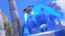 a robot is flying through the air with a blue beam coming out of its mouth .