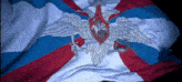 a red white and blue flag with a shield and a sword on it