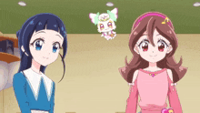 two anime girls are standing next to each other with a cat in the background that says ' a ' on it