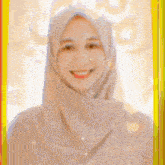 a woman wearing a hijab is smiling in front of a thank you message