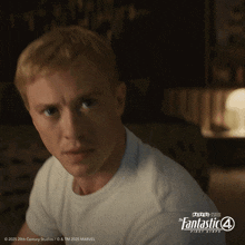 a poster for the fantastic 4 first steps shows a man
