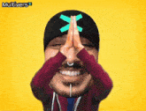 a man is wearing a hat that says esc