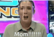 a woman with a face shield on her face says mom