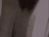 a close up of a man 's face with a smile