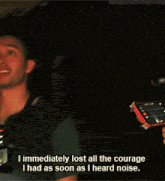 a man is holding a flashlight in front of a tree and says i immediately lost all the courage