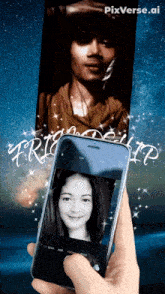 a hand holding a cell phone with a picture of a woman on it
