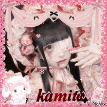 a girl with a bandage on her eye and the name kamitex