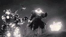 a black and white photo of a robot with a large circle on his chest