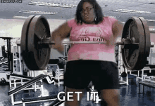 girl funny lifting weights dancing