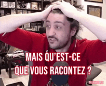 a man in a red shirt has his hands on his head and the words mais qu'est-ce que vous racontez