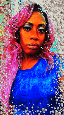 a woman with pink hair and pearls around her