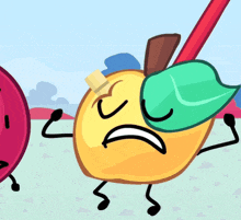 a cartoon drawing of a yellow apple with a green leaf on its face