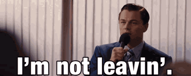 The Wolf Of Wall Street Im Still Here GIF - The Wolf Of Wall Street Im  Still Here Im Not Leaving - Discover & Share GIFs