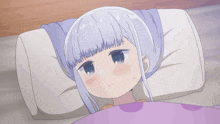 a girl with white hair is laying in bed with a pillow