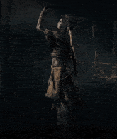 a skeleton with a hood on is standing in a dark forest