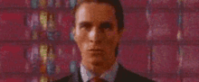 a close up of a man 's face with his eyes open .
