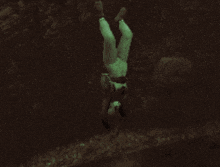 a person is jumping in the air with a backpack on their back