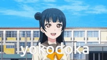 a girl in a school uniform is standing in front of a building that says yokodoka on it