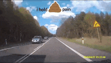 a picture of a car driving down a highway with the words i hold pain written above it