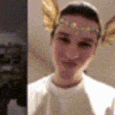 a blurry picture of a woman wearing a headband with wings on it