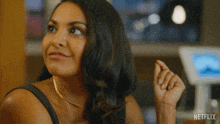 a woman in a netflix ad is smiling