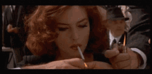 Monica Bellucci GIF - Monica Bellucci Smoking GIFs