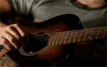 Archie Playing Guitar GIF