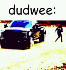 a blue truck is driving through a desert with the words dudwee written on the bottom