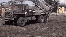 a military truck has a sticker on the side that says ' us army ' on it