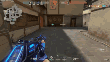 a person is holding a gun in a video game with a score of 30