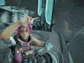 a woman with pink hair is sitting in a room with a reflection of a person in the window