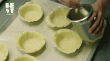 a tray of pie crusts with best products written on the top