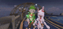 a boy in a green frog hoodie and a girl in a white rabbit hoodie