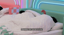 a video of a couple laying in bed with a caption that says " olandria diagnose me what i got "