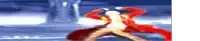 a blurred image of a person in a red coat standing on a snowy surface .