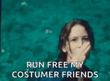 a woman is giving the middle finger and saying `` run free my consumer friends '' .