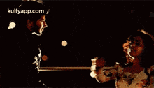 a man and a woman are dancing in a dark room with the words `` his summer '' written on the bottom .