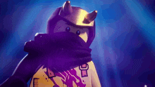 a lego figure with horns and a scarf around his head