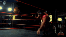 a woman in a wrestling ring with the words new south on the bottom left