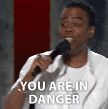 You Are In Danger Chris Rock GIF - You Are In Danger Chris Rock Chris Rock Selective Outrage GIFs