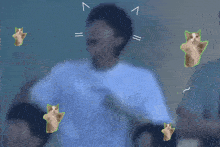 a man in a blue shirt is surrounded by a bunch of bears