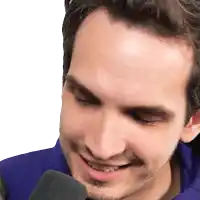 a close up of a man 's face with his eyes closed and his mouth open